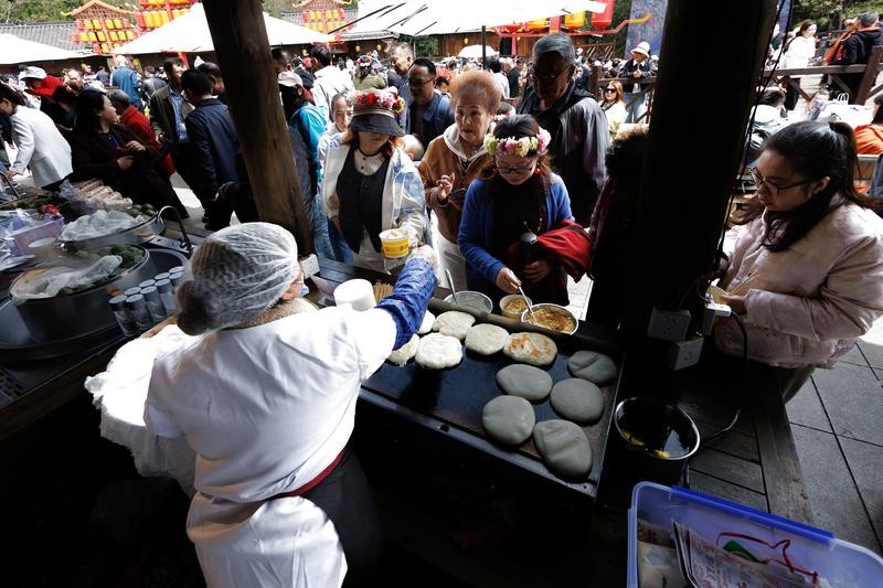 中國多地遊客開啟“尋味之旅”